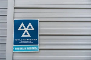 Check-a-Vehicle's-MOT-with-garage-services-sign