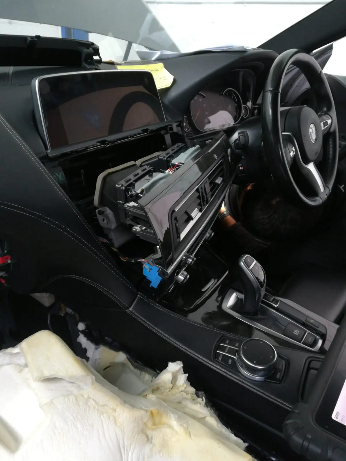 bmw-dashboard-and-infotainment-system-disassembled-for-electrical-repair